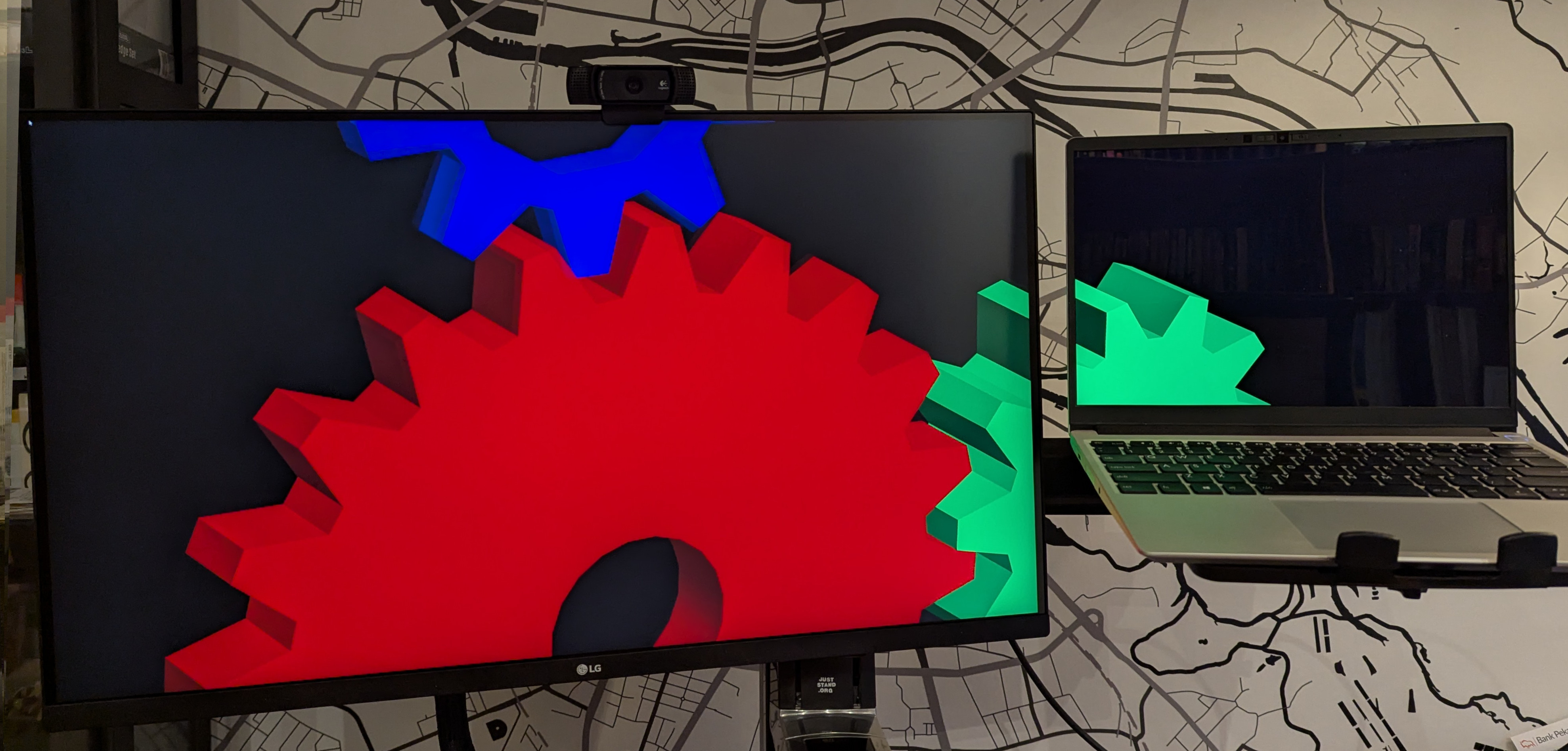 The two displays forming a group, each showing a part of the application